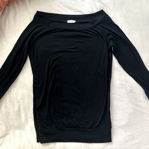 Black, long sleeve, off the shoulder blouse. Size small but wears big